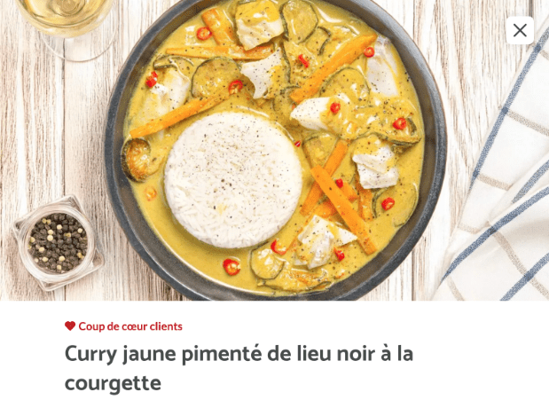 Screenshot 2025-03-28 at 6.36.07 PM Plat cuisiné Quitoque : curry jaune pimenté de lieu noir à la courgette, accompagné de riz, avec poivrons et rondelles de courgette, coup de cœur des clients.