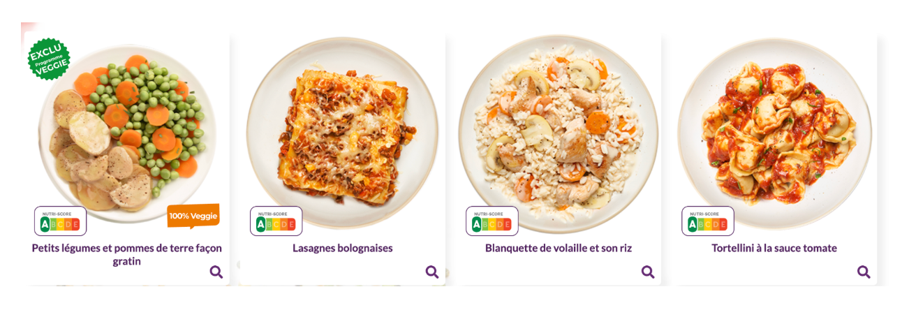 Screenshot 2025-07-06 at 12.42.56 PM Quatre plats préparés Comme J’aime présentés dans des assiettes : petits légumes et pommes de terre façon gratin (100% veggie), lasagnes bolognaises, blanquette de volaille et son riz, tortellini à la sauce tomate, tous avec Nutri-Score affiché