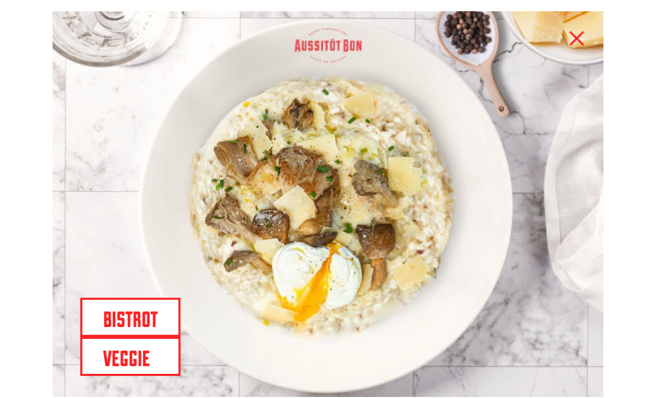 Screenshot 2025-07-26 at 10.36.10 AM Plat végétarien Aussitôt Bon : risotto crémeux aux champignons, copeaux de parmesan et œuf poché, classé dans les catégories Bistrot et Veggie.